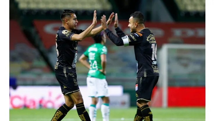 José Ramírez of León celebrates with Luis Montes after scoring his team's second goal against Santos Laguna (Getty).