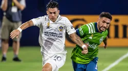 Cristian Pavón of Los Angeles Galaxy (left) battles Cristian Roldán of Seattle Sounders (Getty).