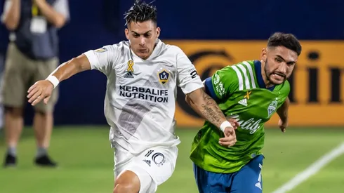 Cristian Pavón of Los Angeles Galaxy (left) battles Cristian Roldán of Seattle Sounders (Getty).