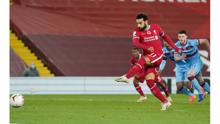 Liverpool's Mo Salah shoots a penalty to score for his team against West Ham (Getty).