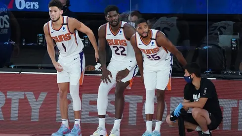 Devin Booker, Deandre Ayton, and Mikal Bridges. (Getty)