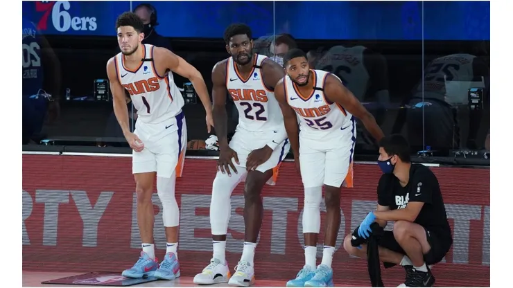 Devin Booker, Deandre Ayton, and Mikal Bridges. (Getty)