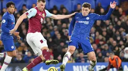 Andreas Christensen (right) of Chelsea challenges Chris Wood of Burnley (left). (Getty)