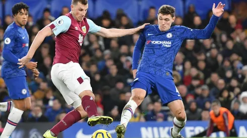 Andreas Christensen (right) of Chelsea challenges Chris Wood of Burnley (left). (Getty)