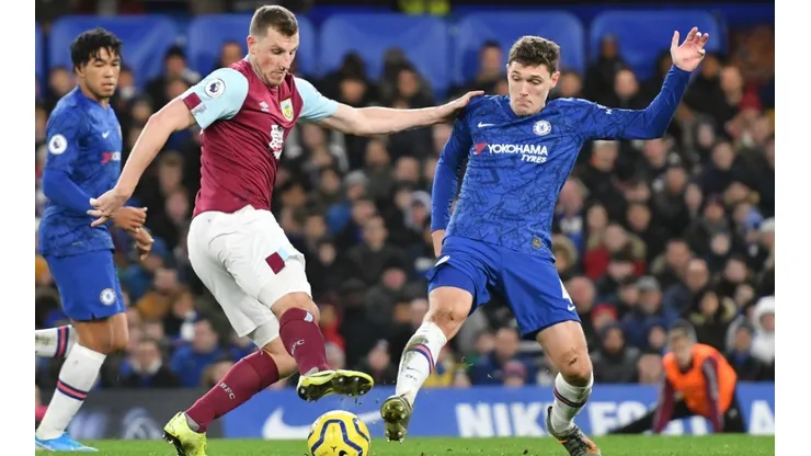 Andreas Christensen (right) of Chelsea challenges Chris Wood of Burnley (left). (Getty)