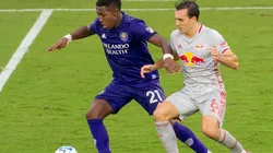 Orlando City midfielder Andres Perea (left) and New York Red Bulls midfielder Jared Stroud (right). (Getty)