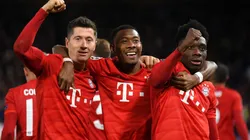 Robert Lewandowski of Bayern Munich celebrates with David Alaba and Alphonso Davies. (Getty)