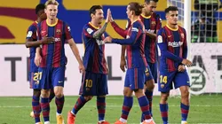 Lionel Messi, Antoine Griezmann and teammates of FC Barcelona celebrate a goal. (Getty)
