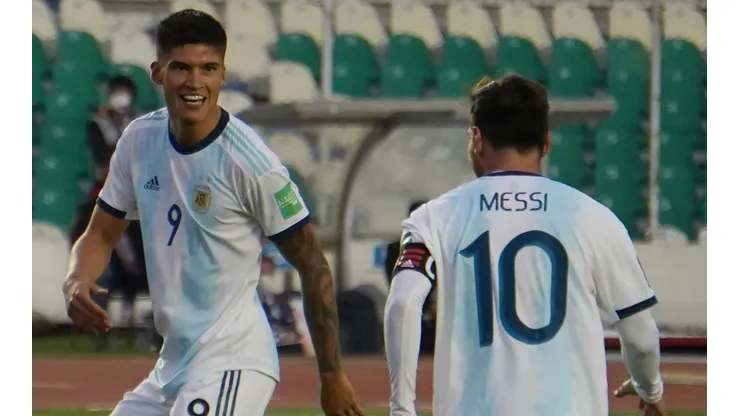 Argentina's Joaquín Correa (left) celebrates with Lionel Messi after scoring the winning goal against Bolivia (Getty).