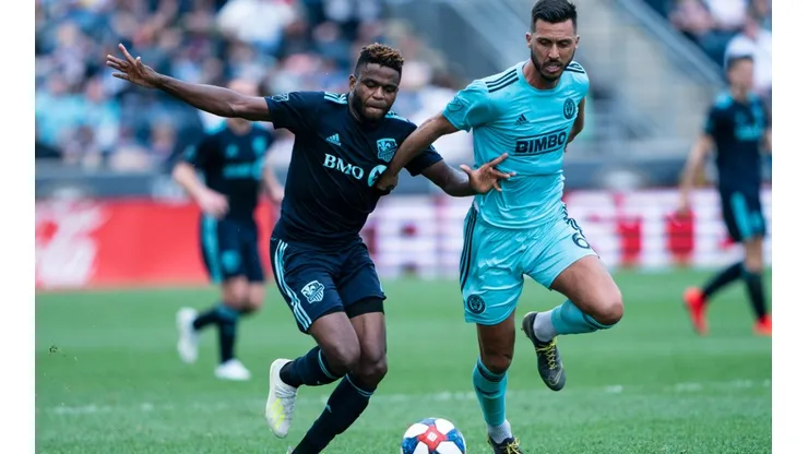 Montreal Impact Midfielder Orji Okwonkwo (left) and Philadelphia Union Midfielder Haris Medunjanin (right) battle for the ball. (Getty)