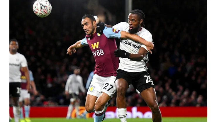 Aston Villa's Ahmed Elmohamady (left) and Fulham's Josh Onomah battle for the ball. (Getty)