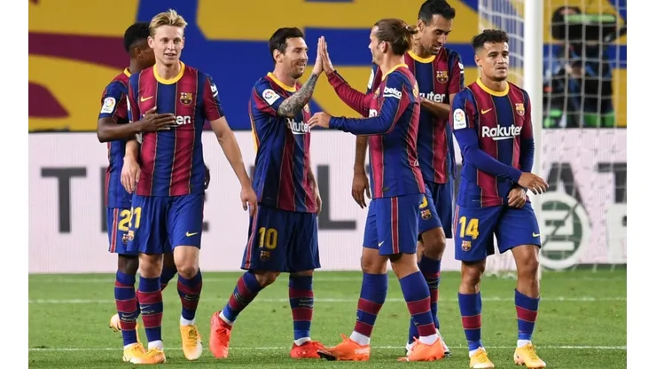 Barcelona's Lionel Messi celebrate with teammates after scoring against Villarreal (Getty).