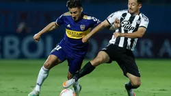 Eduardo Salvio of Boca Juniors (left) fights for the ball with Iván Piris of Libertad (Getty).