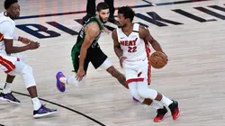 Jimmy Butler dribbles past Jayson Tatum. (Getty)