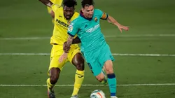 Villarreal's Andre-Frank Zambo Anguissa (left) and FC Barcelona's forward Lionel Messi (right). (Getty)