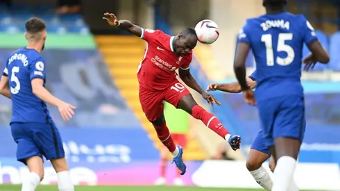 Liverpool's Sadio Mane scores with a header against Chelsea in a second round match of the English Premier League (Getty).