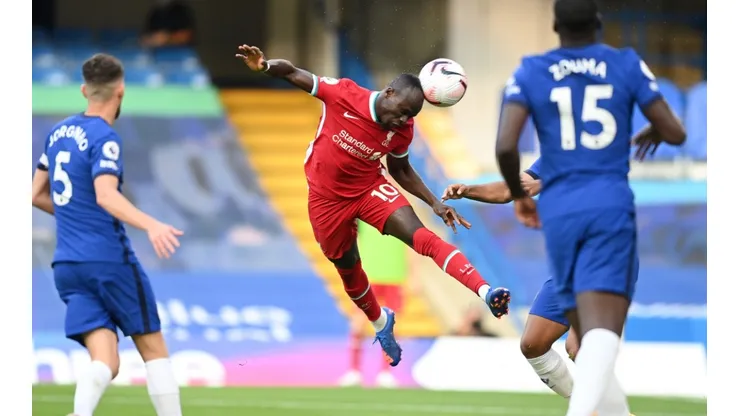 Liverpool's Sadio Mane scores with a header against Chelsea in a second round match of the English Premier League (Getty).