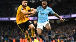 Raheem Sterling of Manchester City (right) is tackled by Ruben Neves of Wolverhampton Wanderers (left). (Getty)