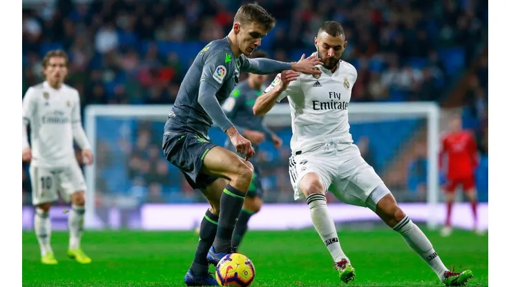 Real Sociedad vs Real Madrid: Diego Llorente of Real Sociedad (left) competes for the ball with Karim Benzema of Real Madrid (Getty).
