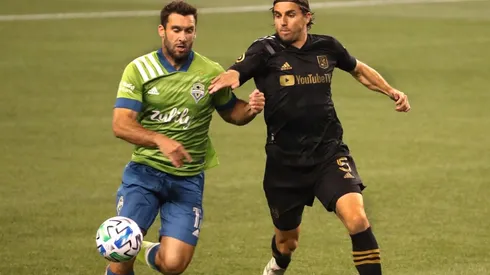 Will Bruin of Seattle Sounders (left) and Dejan Jakovic of LAFC (right). (Getty)