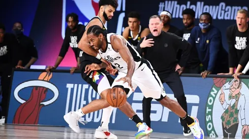 Jamal Murray guarding Kawhi Leonard. (Getty)