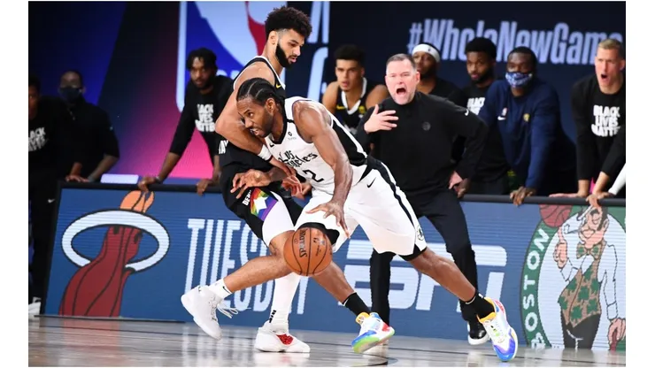 Jamal Murray guarding Kawhi Leonard. (Getty)