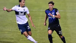 Patrick Metcalfe of Vancouver Whitecaps (left) and Jukka Raitala of Montreal Impact (right). (Getty)