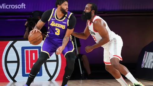 James Harden guarding Anthony Davis in the post. (Getty)