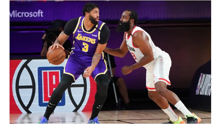 James Harden guarding Anthony Davis in the post. (Getty)