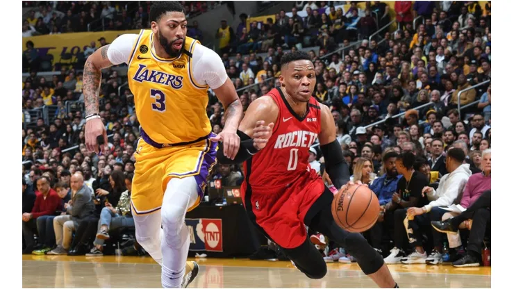 Russell Westbrook dribbles past Anthony Davis. (Getty)
