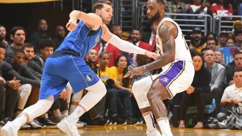 Luka Doncic trying to get past LeBron James. (Getty)