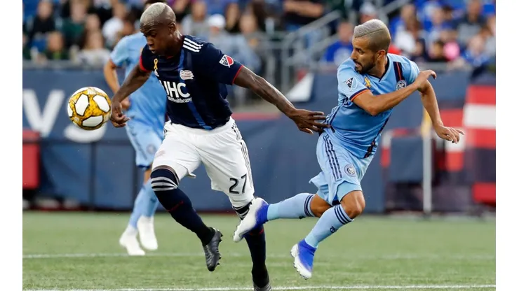 New England Revolution vs. New York City FC: Luis Caicedo of New England (left) and Maxi Moralez of NYCFC (Getty).
