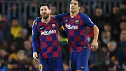 Barcelona's Luis Suárez (right) celebrates with teammate Lionel Messi after scoring a goal (Getty).