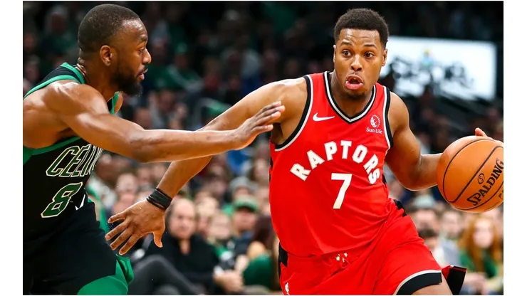 Kemba Walker guarding Kyle Lowry of the Raptors. (Getty)