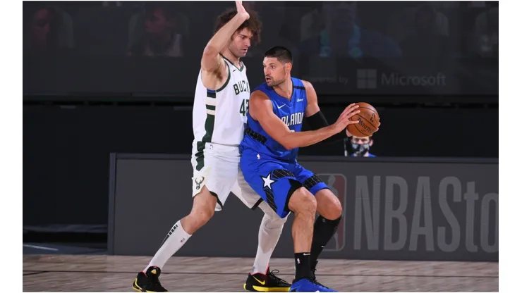Robin Lopez of Bucks guarding Nikola Vucevic. (Getty)