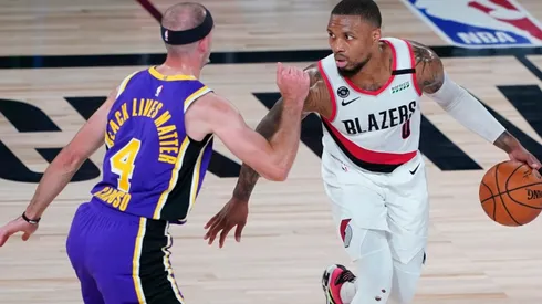 Damian Lillard guarded by Alex Caruso. (Getty)