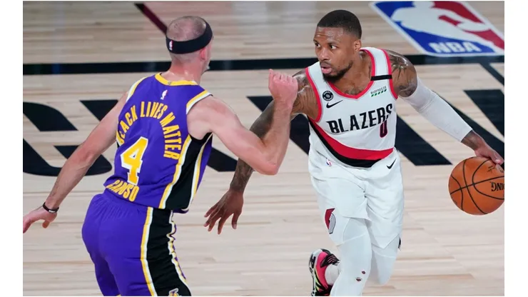 Damian Lillard guarded by Alex Caruso. (Getty)
