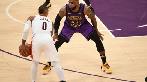 LeBron James guarding Damian Lillard. (Getty)