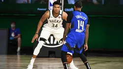Bucks' star Giannis Antetokounmpo guarding DJ Augustin. (Getty)