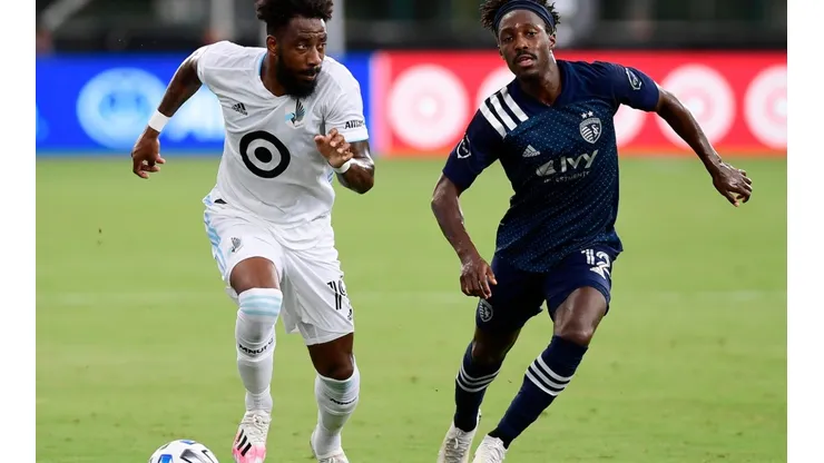 Minnesota United FC vs. Sporting Kansas City: Romain Metanire of Minnesota United (left) runs the ball past Gerso of Sporting Kansas City (Getty).