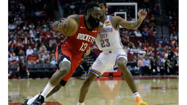 James Harden dribbles past Terrance Ferguson. (Getty)