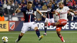 Atlanta United FC forward Josef Martínez (7) blasts a shot past New England Revolution defender Antonio Mlinar Delamea (Getty).
