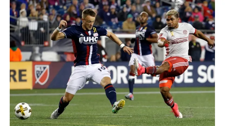 Atlanta United FC forward Josef Martínez (7) blasts a shot past New England Revolution defender Antonio Mlinar Delamea (Getty).