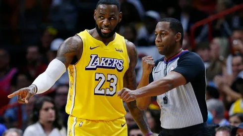 LeBron James arguing with referee Mitchell Ervin. (Getty)