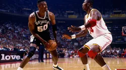 Hakeem Olajuwon defending David Robinson in the paint. (Getty)
