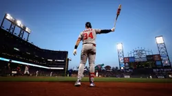 Bryce Harper of the Philadelphia Phillies warms up on the on-deck circle (Getty).