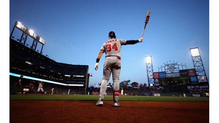 Bryce Harper of the Philadelphia Phillies warms up on the on-deck circle (Getty).