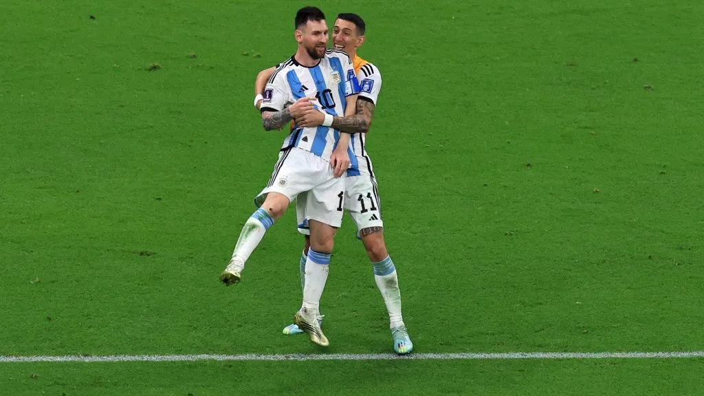 Lionel Messi of Argentina celebrates with Angel Di Maria after scoring the teamās third goal during the FIFA World Cup Qatar 2022 Final match. Buda Mendes/Getty Images