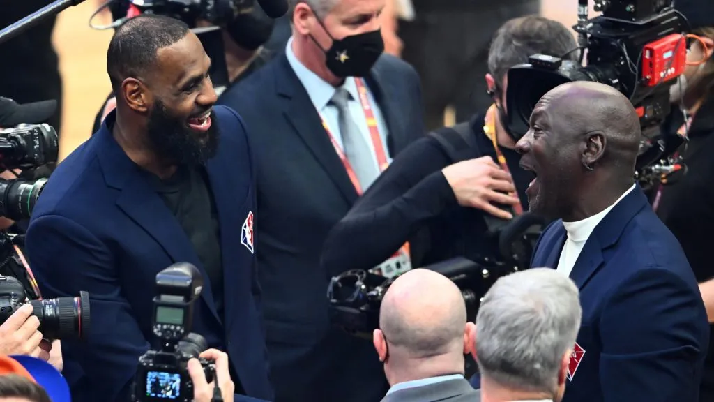 Michael Jordan and LeBron James talk after the presentation of the NBA 75th Anniversary Team during the 2022 NBA All-Star Game at Rocket Mortgage Fieldhouse on February 20, 2022 in Cleveland, Ohio.  (Photo by Jason Miller/Getty Images)