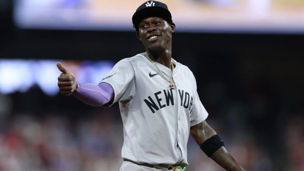 Jazz Chisholm Jr #13 of the New York Yankees smiles to a fan during the ninth inning against the Philadelphia Phillies at Citizens Bank Park. (Photo by Heather Barry/Getty Images)